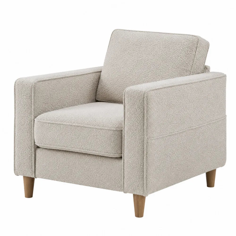Poltrona beige in tessuto bouclé con gambe in legno