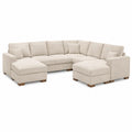 Divano ad angolo in tessuto beige con struttura in legno massello