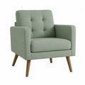 Poltrona in tessuto verde con gambe in legno